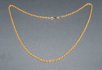 SAUTOIR en or jaune 18K (750/°°) à maille...