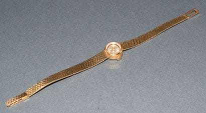 BRACELET MONTRE en or jaune 18K (750/°°),...
