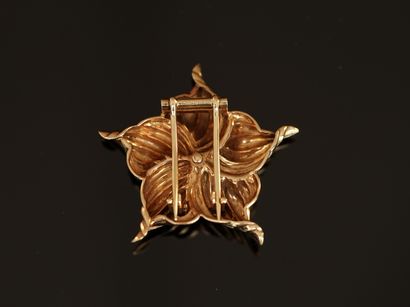 CARTIER - CORSAGE CLIP in 14K (585°/°°) yellow...