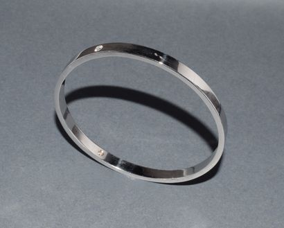 JONC in 18K (750/°°) white gold, punctuated...