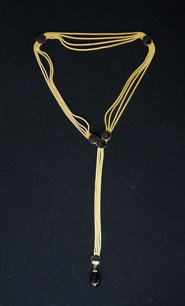 Gilded metal belt with several square snake...