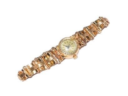 AUREOLE - MONTRE BRACELET de dame en or jaune...