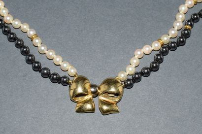 COLLAR in 18K (750/°°) yellow gold with two...