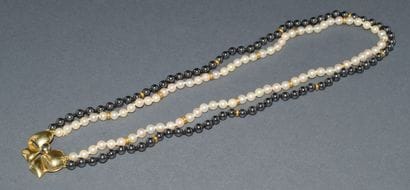 COLLAR in 18K (750/°°) yellow gold with two...