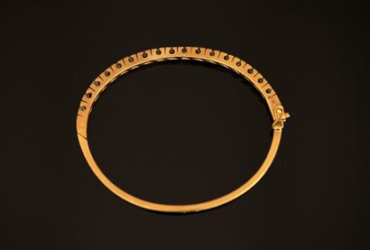 BRACELET JONC opening in 18K (750/°°) yellow...