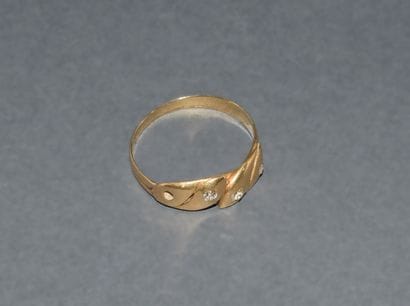 BAGUE d’homme en or jaune 18K (750/°°), sertie...