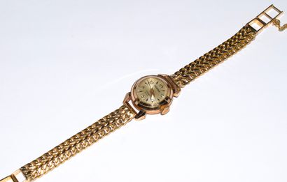 HODNA - MONTRE BRACELET signée, en or jaune...