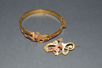 DEMI-PARURE en or jaune 18K (750/°°), composée...