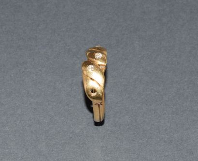 BAGUE d’homme en or jaune 18K (750/°°), sertie...