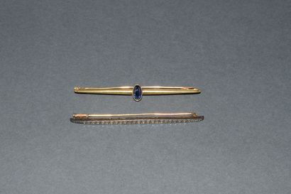 ENSEMBLE en or jaune 18K (750/°°) comprenant...