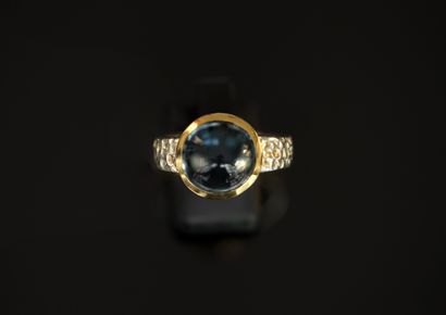 BAGUE en argent doré et argent 925/°° centrée...