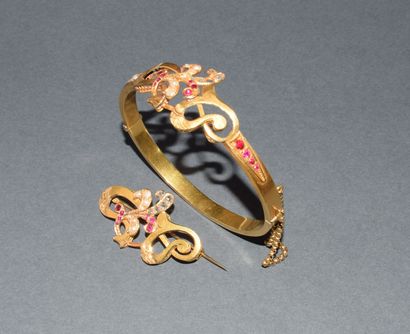 DEMI-PARURE en or jaune 18K (750/°°), composée...