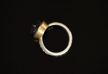 BAGUE en argent doré et argent 925/°° centrée...