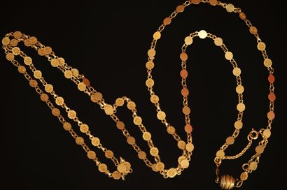 SAUTOIR en or jaune 18k (750/°°) formé de...