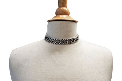 Silver-plated choker with interlocking links....