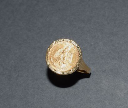 BAGUE en or jaune 18K (750/°°) ornée d’une...