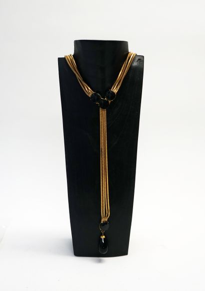 Gilded metal belt with several square snake...