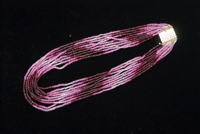 COLLAR with 9 strands of small ruby beads...