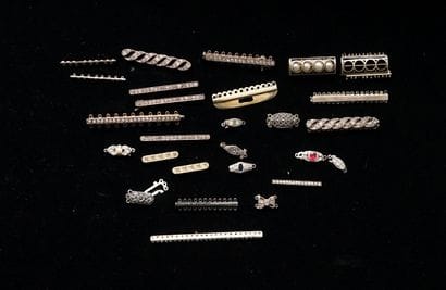 SET in min. 800/°° silver and silver-plated...