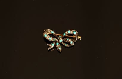 18K (750/°°) yellow gold and silver (800/°°)...