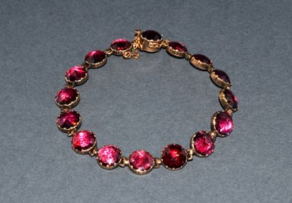 BRACELET in 18K (750/°°) yellow gold adorned...