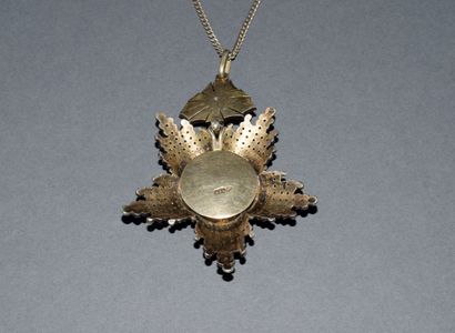 MEDAL in silver min 800/°° featuring the...