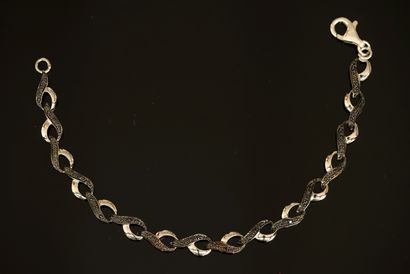BRACELET en argent 925/°° à maillons en forme...