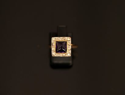 18K (750/°°) white and yellow gold ring centered...