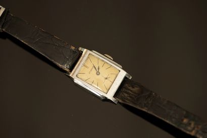 ETERNA - Steel wristwatch, beige background,...