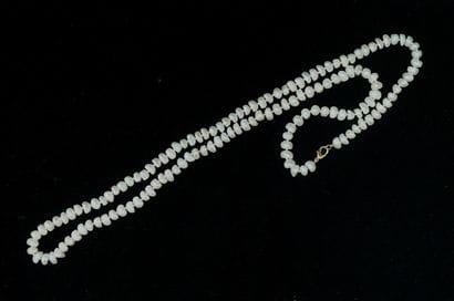 SAUTOIR of white freshwater cultured pearls,...