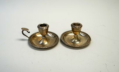 Ensemble de 2 bougeoirs à main en argent...