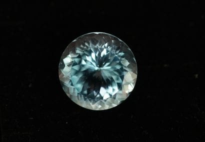 Round faceted blue TOPAZE on paper for 39.45cts....