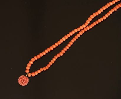 NECKLACE in orange coral, composed of small...