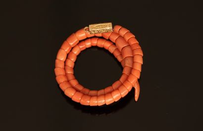 BRACELET ELEMENT composed of orange coral...