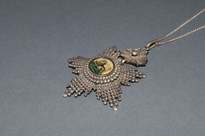 MEDAL in silver min 800/°° featuring the...