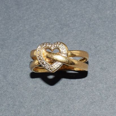 RING in 18K (750 /°°) yellow and white gold...