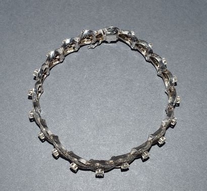 BRACELET rivière in 18k (750/°°) white gold,...
