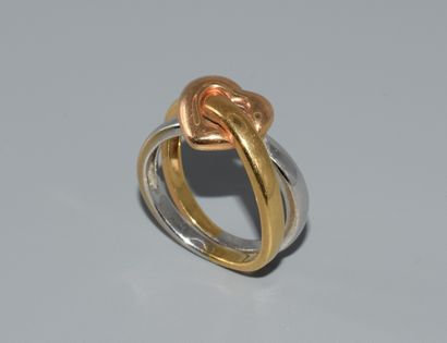 RING in 18K (750/°°) yellow gold forming...