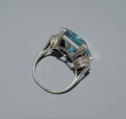 Art Deco platinum ring, centered on a Santa...
