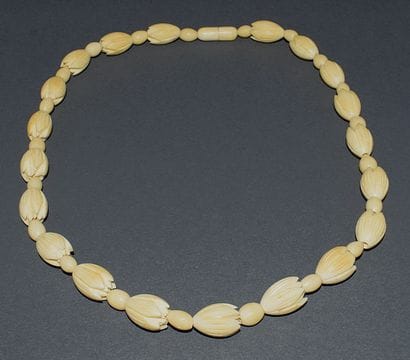 BONE COLLAR with alternating flower and oval...