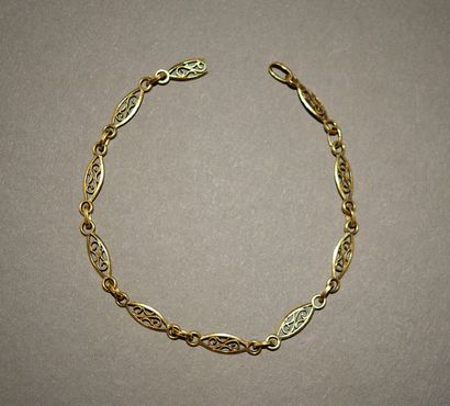BRACELET in 18K (750 /°°) yellow gold with...