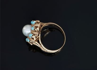 RING in 18K (750/°°) yellow gold with flower...