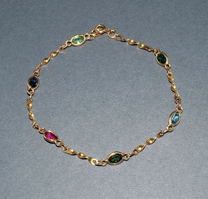BRACELET in 18K (750 /°°) yellow gold, twisted...