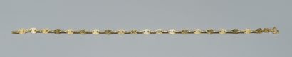 BRACELET in 18K (750/°°) yellow gold, fancy...