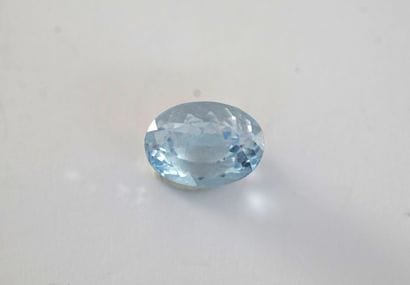 Blue oval faceted TOPAZE on paper for 14.7cts....