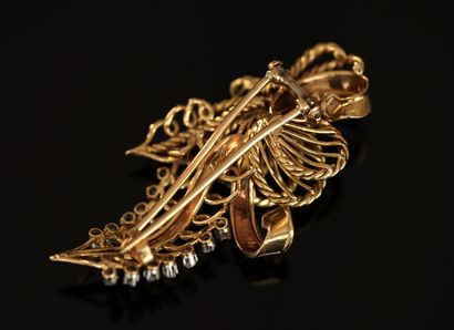 18k (750/°°) yellow gold BROCHURE formed...