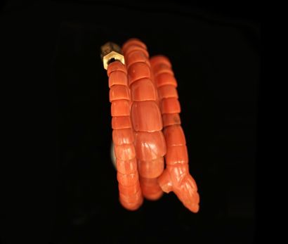 BRACELET ELEMENT composed of orange coral...