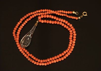 COLLAR of orange coral in a slight drop,...