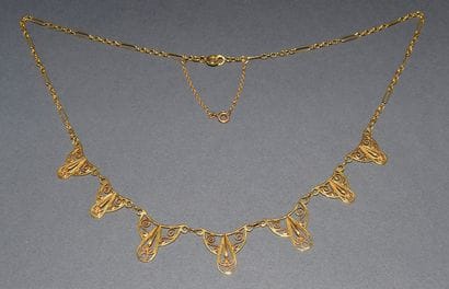 DRAPERIE NECKLACE in 18K (750 /°°) yellow...