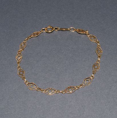 BRACELET in 18K (750 /°°) yellow gold with...